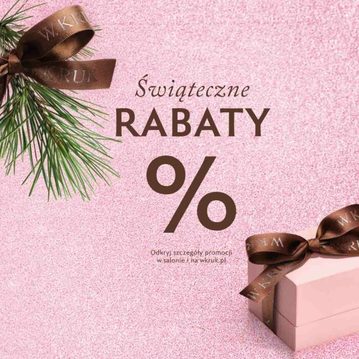 Grafika W.KRUK – świąteczne rabaty, różowe tło, pudełko prezentowe z brązową wstążką i gałązką świerku.