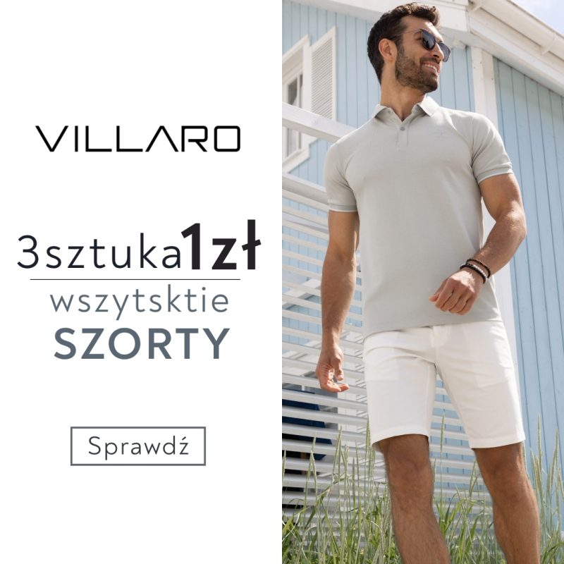 Mężczyzna w szarym polo i białych szortach, uśmiechnięty, stojący na tle jasnego budynku. Obok logo Villaro i informacja o promocji: 3. sztuka za 1 zł na wszystkie szorty.