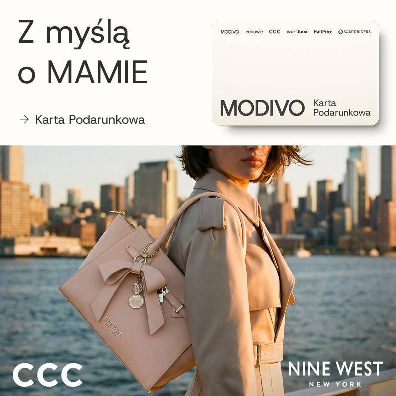 Kobieta w beżowym płaszczu z różową torebką Nine West na tle panoramy miasta. Obok grafika z Kartą Podarunkową MODIVO i napisem 'Z myślą o MAMIE'.