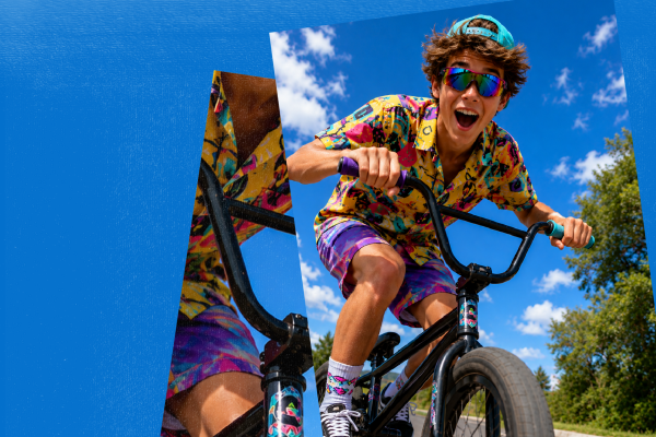 Chłopak na rowerze BMX w letniej stylizacji – wydarzenie O!dpicuj swój rower, Outlet Park Szczecin